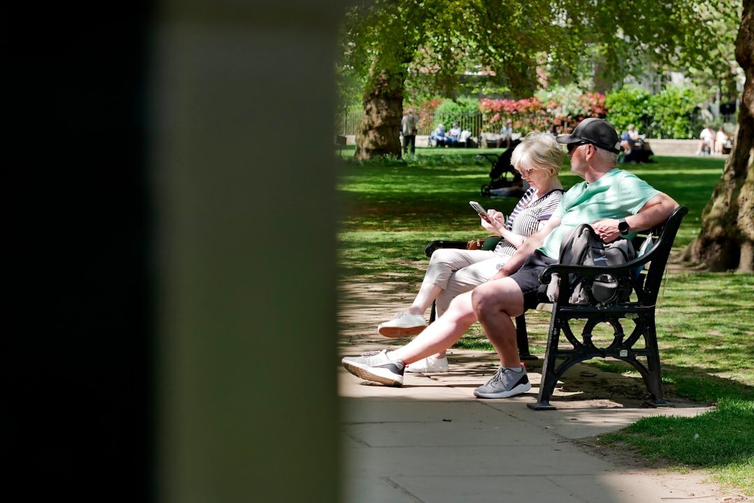 seniors walking in spring park