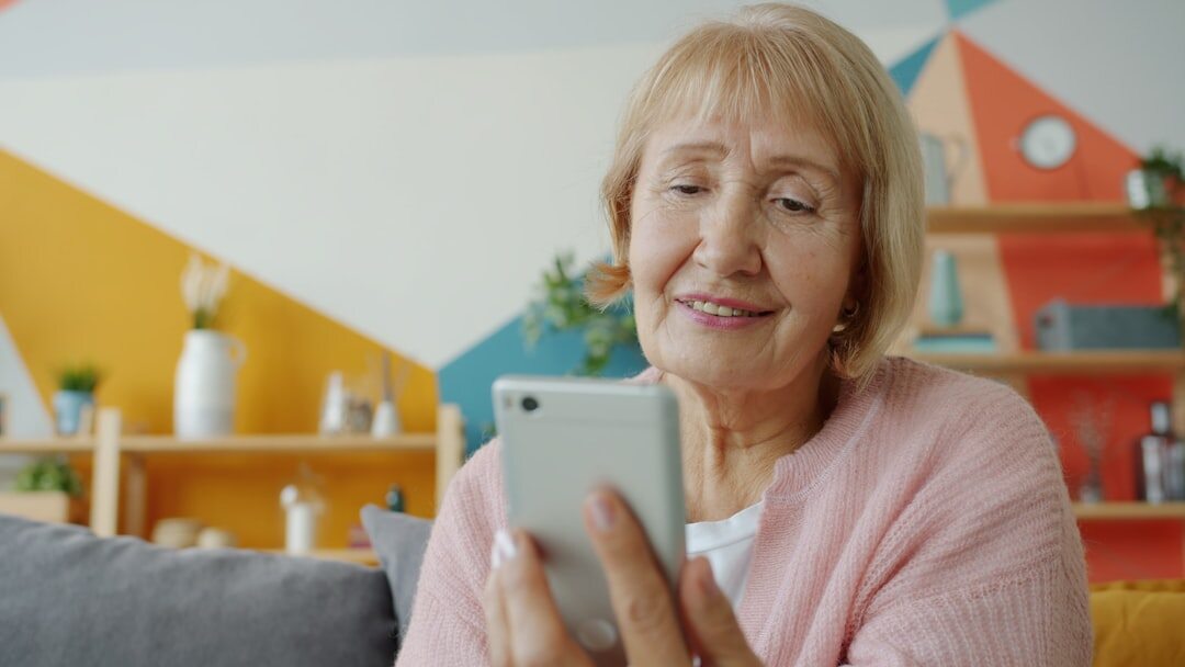 senior using smartphone