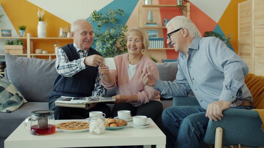 elderly people discussing documents