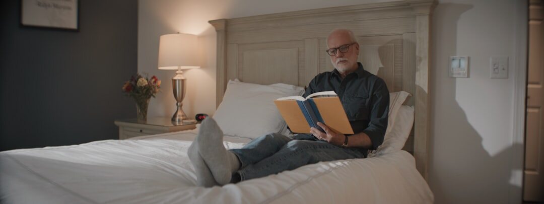 senior man reading book
