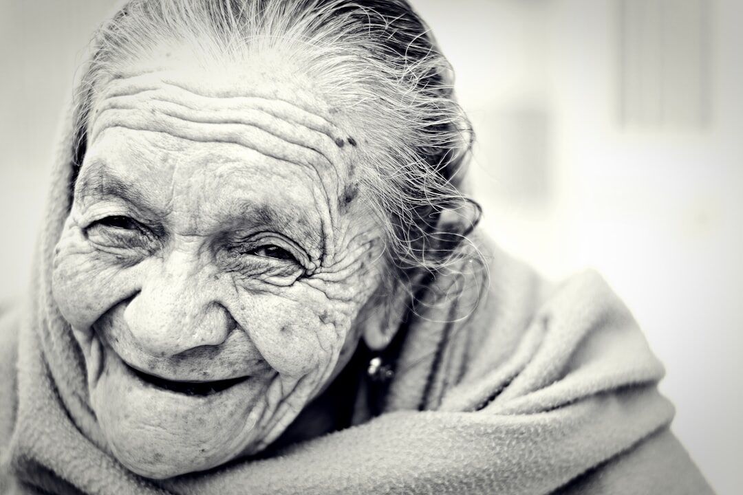 elderly woman smiling alone