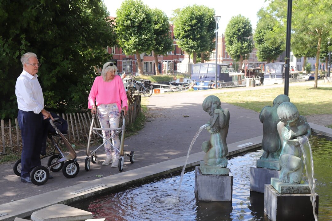 elderly people chatting in park